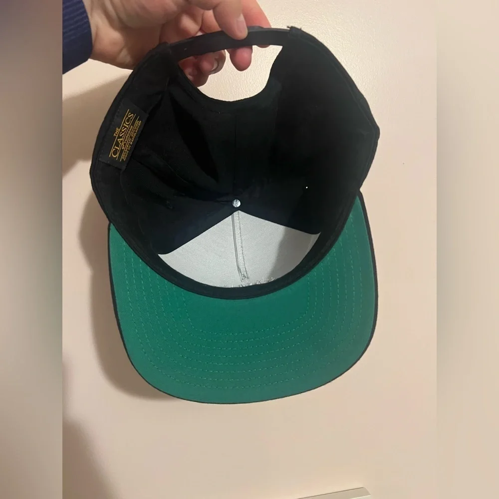 Black Actin Up Company Snapback Hat